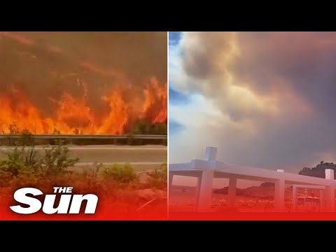 Huge wildfire on Greek holiday island Rhodes as thousands evacuate from hotels &amp; rescued off beaches